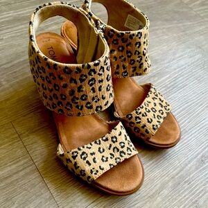 Animal print block heels sandals.